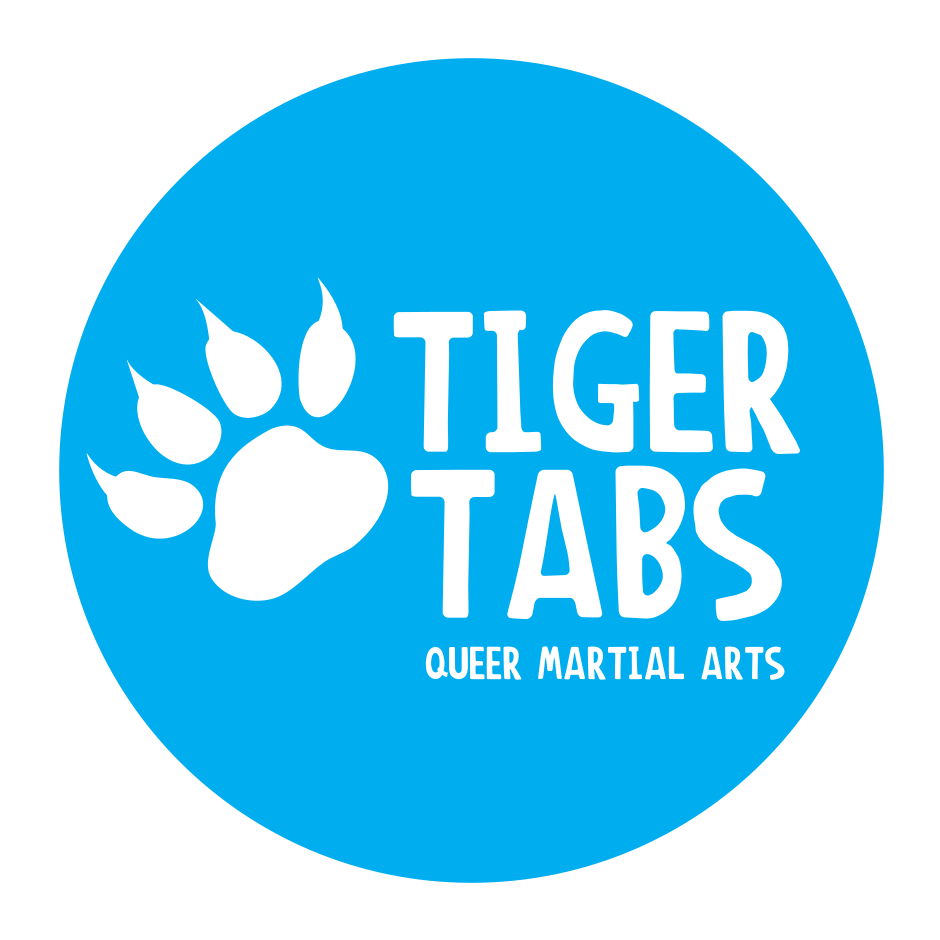 Das Logo der Gruppe Tiger Tabs: Eine weiße Tatze auf blauem Grund
